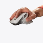 A side view of the dark gray Logitech MX MASTER 3S Lite mouse, showing the ergonomic shape, side scroll wheel, and two thumb buttons. A bottom view of the dark gray Logitech MX MASTER 3S Lite mouse, showing the optical sensor, power switch, and Easy-Switch pairing buttons (1, 2, 3). A person's hand rests comfortably on the light grey ergonomic Logitech MX MASTER 3S Lite mouse, with text promoting 8K DPI precision. A man with a beard sits at a desk using the light gray Logitech MX MASTER 3S Lite mouse and keyboard, with text promoting quiet clicks. Product Page | Mymensign Branch Logitech MX MASTER 3S Lite Wireless Mouse